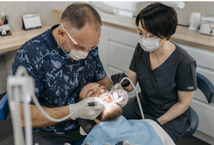 a dentist treating a patient